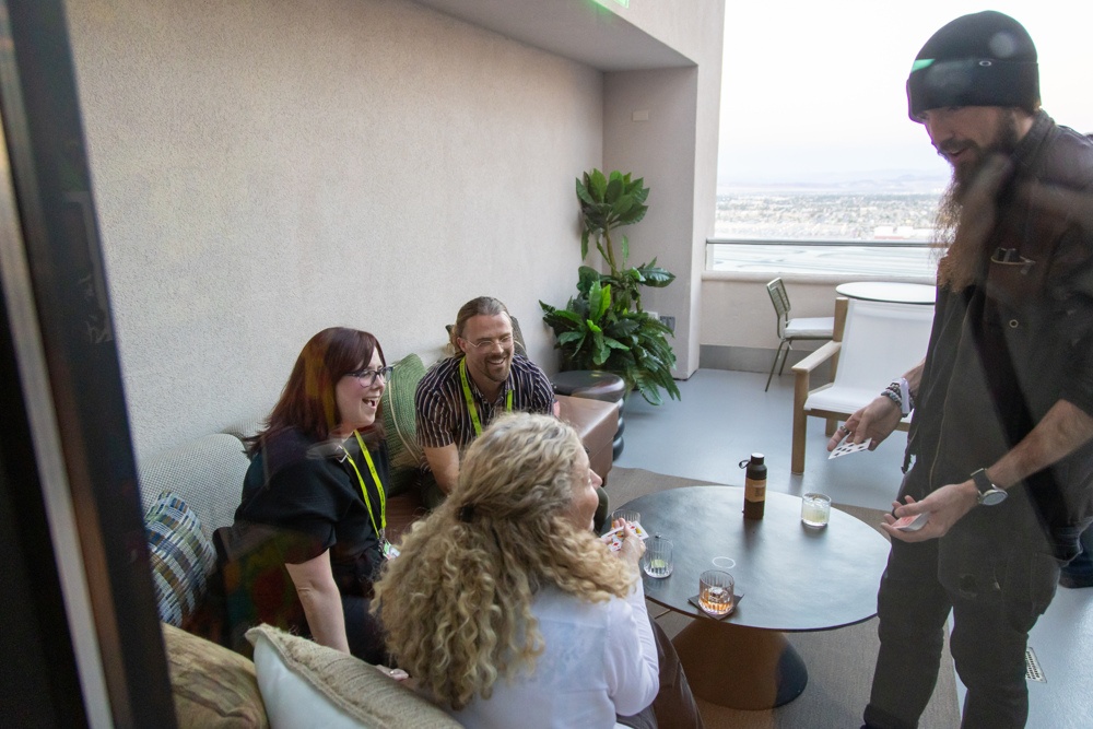 A magician entertains guests at a corporate reception in Las Vegas